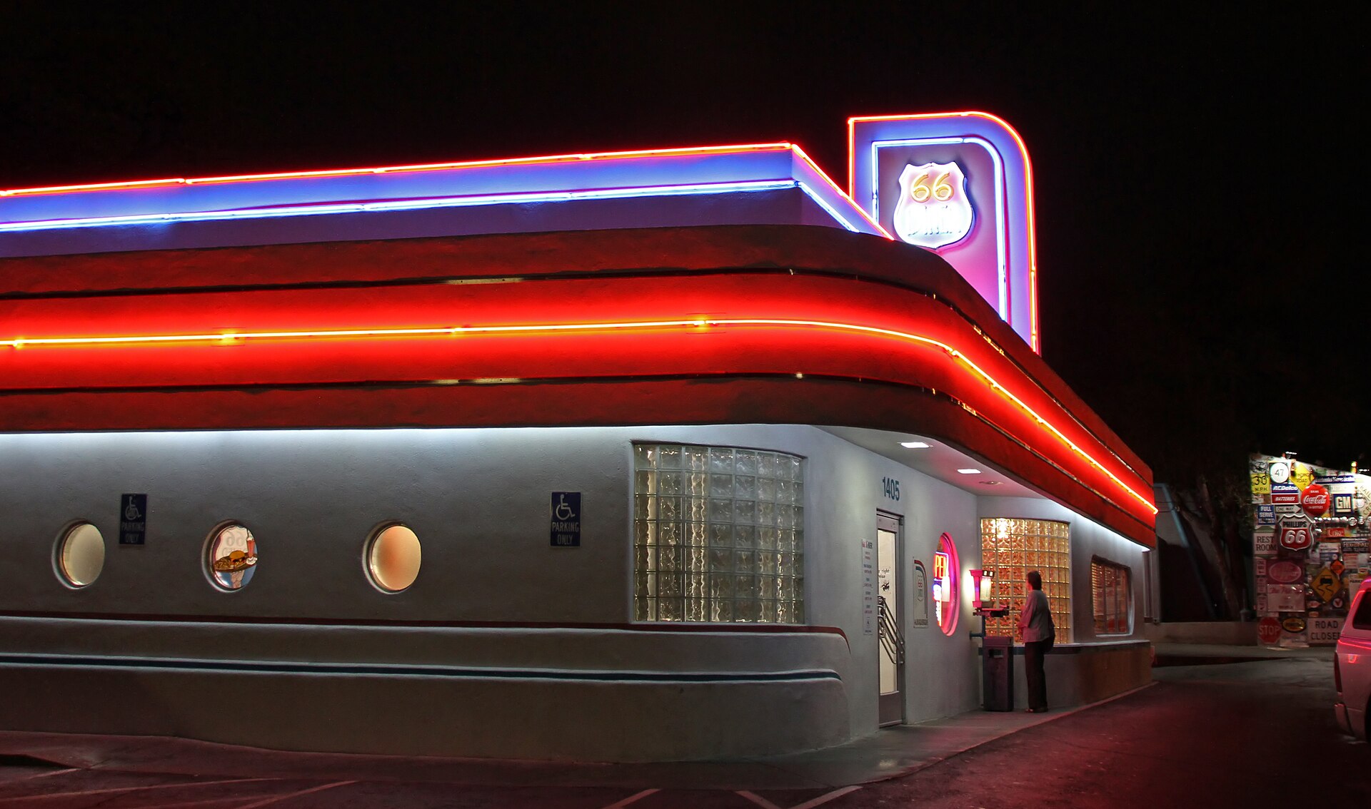 66 Diner retro neon sign lit at night on Central Ave