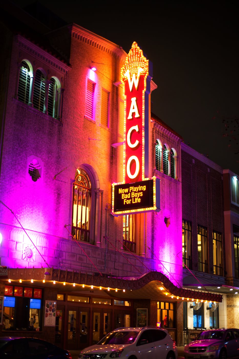 The Waco Hippodrome Theatre marquee lit up at night, downtown Waco